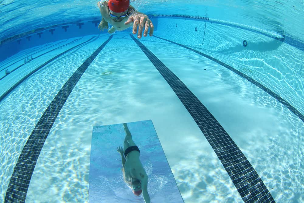 swimmer in the water for the : Competitive Swimming Weight Training article