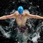 professional swimmer in the pool for the article about: butterfly stroke tips