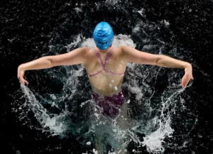 professional swimmer in the pool for the article about: butterfly stroke tips