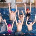 .happy childrens at swimming pool